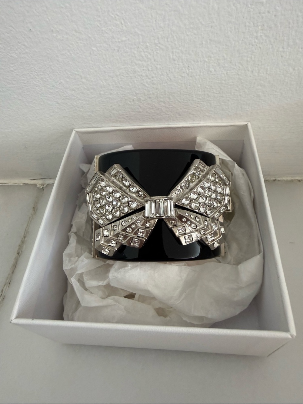 CHANEL Black Cuff Bracelet with Silver Crystal Bow